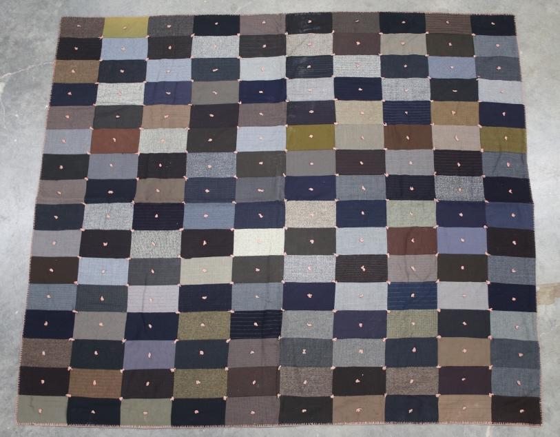 C. 1970's Large Patchwork Quilt: For your consideration in this lot is a c. 1970's large patchwork quilt. This quilt is made of 8" x 4" "patches" of polyester fabric stitched together to make the top. The back of the quilt is a solid