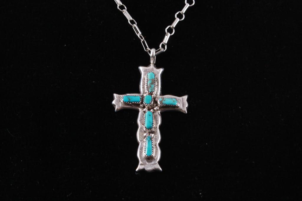 Navajo G&L Leekity Turquoise Navajo Cross Necklace: This is an original fantastic vintage estate sterling silver cross and turquoise necklace from Navajo silversmith's George and Lupeta Leekity. The piece is signed "G&L LEEKITY / STERLING". The cross h