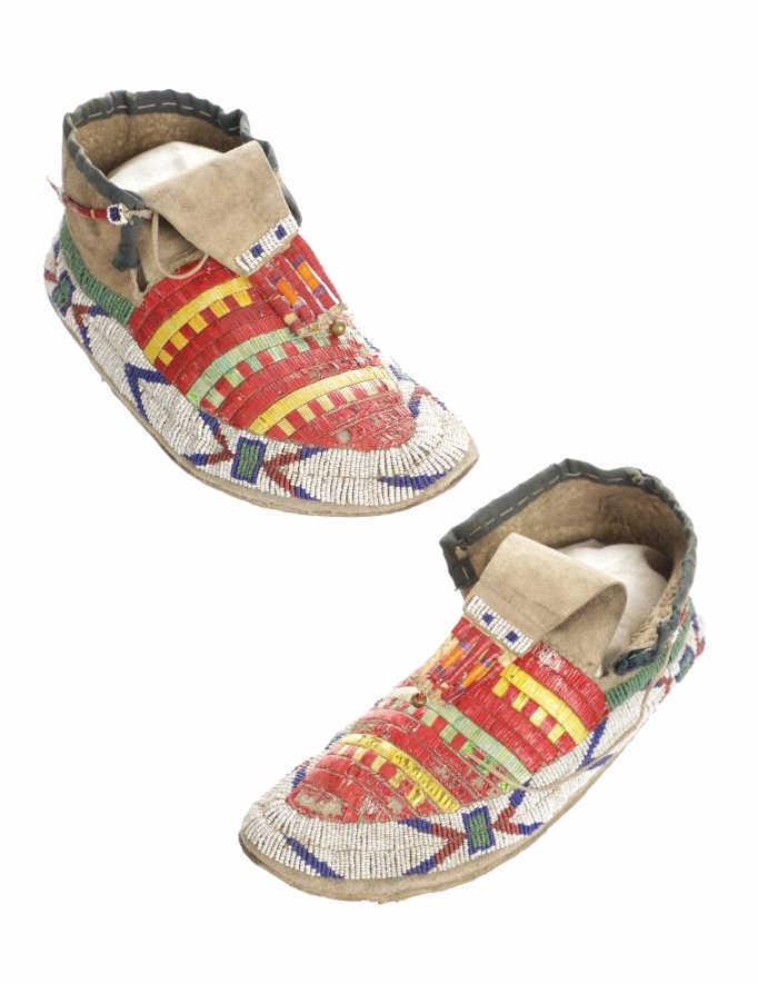 19th C. Sioux Quilled & Beaded Hard Sole Moccasins: This is an exceptional set of early moccasins showing wonderful quillwork and beadwork with hard soles from the Sioux Indians of the 1800's. These 19th Century moccasins are comprised of Indian tanned