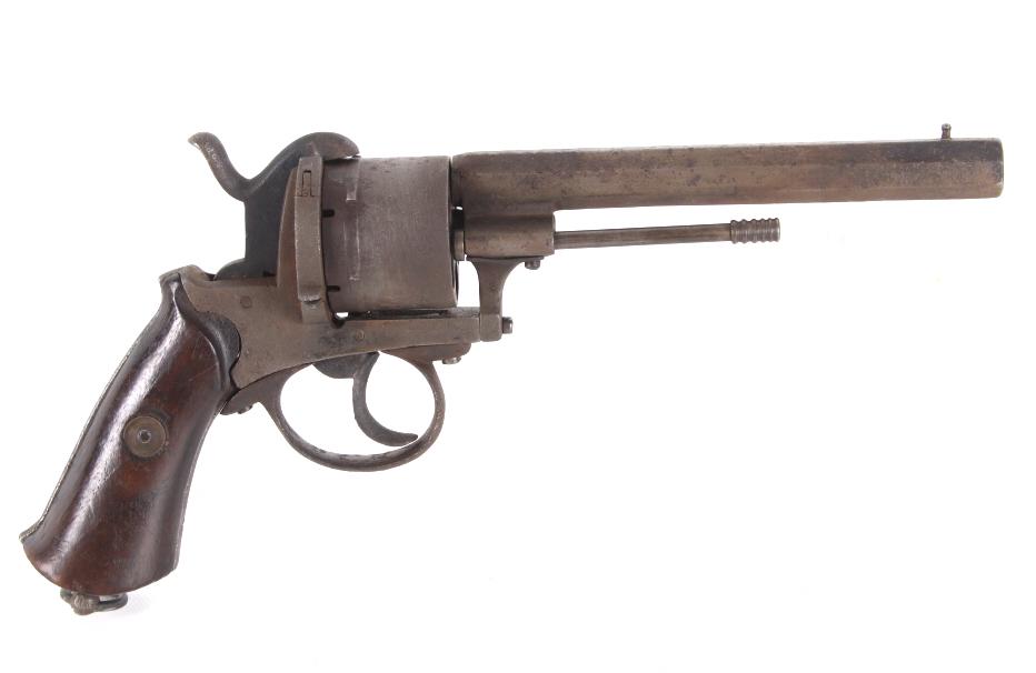 Unmarked European Pin Fire 12mm Revolver: Featured in this lot we have an unmarked European pinfire revolver chambered in 12mm. The revolver originated from the late 1800's to early 1900's by a European manufacture. The piece shows a 5 3/4" l