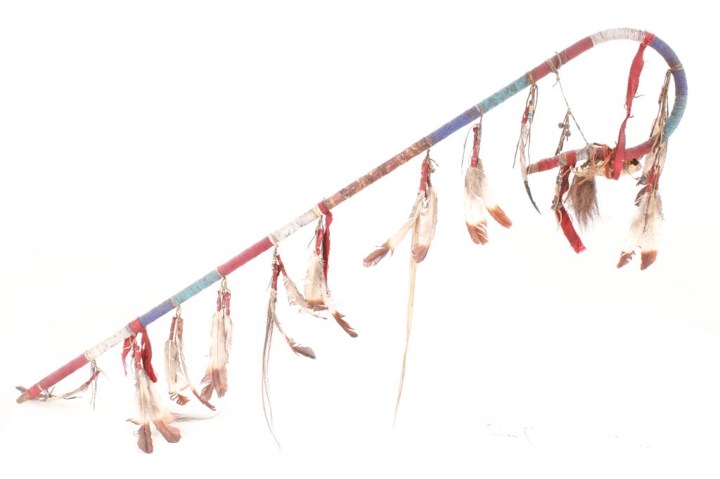 Lakota Sioux Fully Beaded & Feathered Coup Staff: This is an exceptional fully beaded and feathered Warrior Coup Staff from master artist John Young Buck of the Lakota Sioux Native American Indians. The piece was handmade by full blood Lakota Sioux I