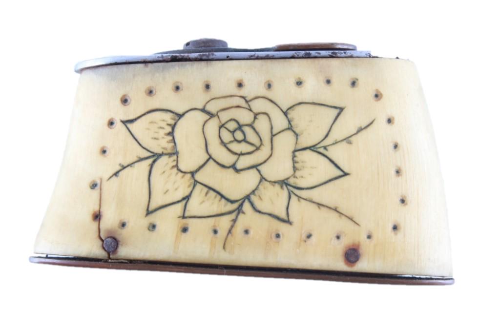 Scrimshaw Carved Polished Bone Snuff Box c. 1950's: Featured in this lot is this scrimshaw carve polished bone snuff box circa 1950's. The bone snuff box features a wonderfully and professionally crafted bone, iron, and brass construction that features