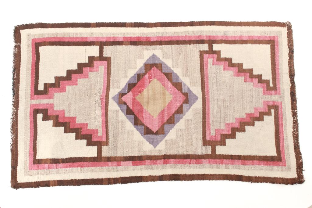 Navajo Stepped Medallion Ganado Rug c. 1930's: Featured in this lot is this Navajo stepped medallion Ganado rug circa 1930's. The rug features a wonderfully and professionally crafted wool construction that shows a large central medallion with ste