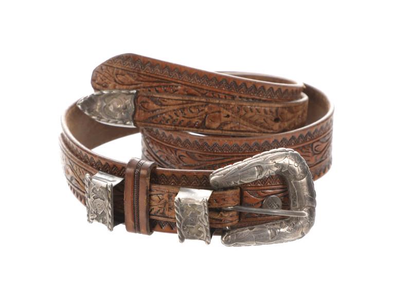 Mexican Sterling Silver Ranger Buckle Justin Belt: Featured in this lot is this Mexican sterling silver ranger buckle and Justin belt c. 1950's. The belt and buckle is wonderfully and professionally crafted leather and sterling silver construction tha