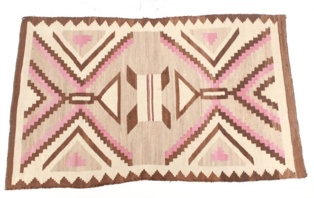 Navajo Old Crystal Eye Dazzler Rug c. 1890-1910: Featured in this lot is this Navajo Old Crystal Eye Dazzler rug circa 1890-1910. The rug features a wonderfully and professionally crafted wool construction that shows a central 'X' formation with a s