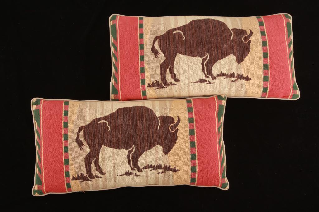 Large Embroidered Buffalo Lumbar Pair of Pillows: Featured in this lot is this large embroidered buffalo lumbar pair of pillows. There are two pillows in this collection. The pillows show wonderfully and professionally crafted embroidered constructio