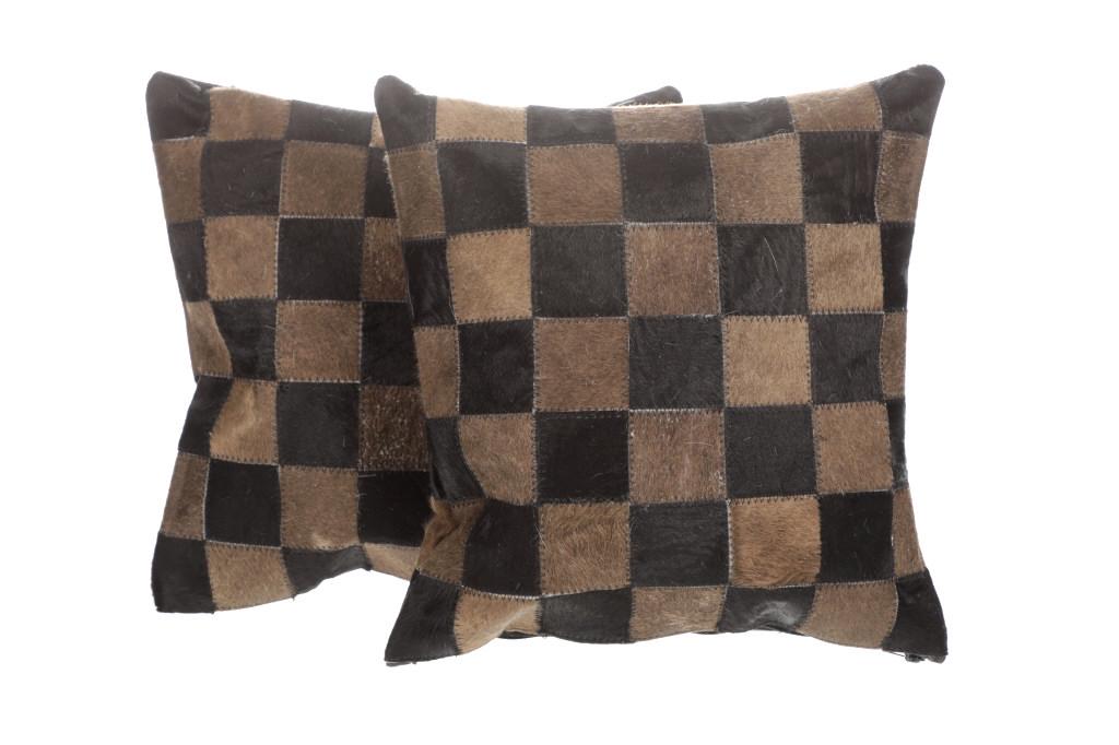 Cowhide Patchwork Double Sided Premium Pillows: Featured in this lot is this pair of premium patchwork cowhide pillows. The pillow shows a cowhide (also referred to as cow hide, steerhide, steer hide, bull hide, longhorn hide) with double sided pat