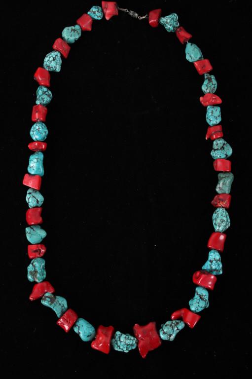 Antique Navajo Turquoise Red Branch Coral Necklace: Featured in this lot is this Antique Navajo turquoise red branch coral necklace. The necklace features a wonderfully and professionally crafted turquoise and red branch coral construction that feature