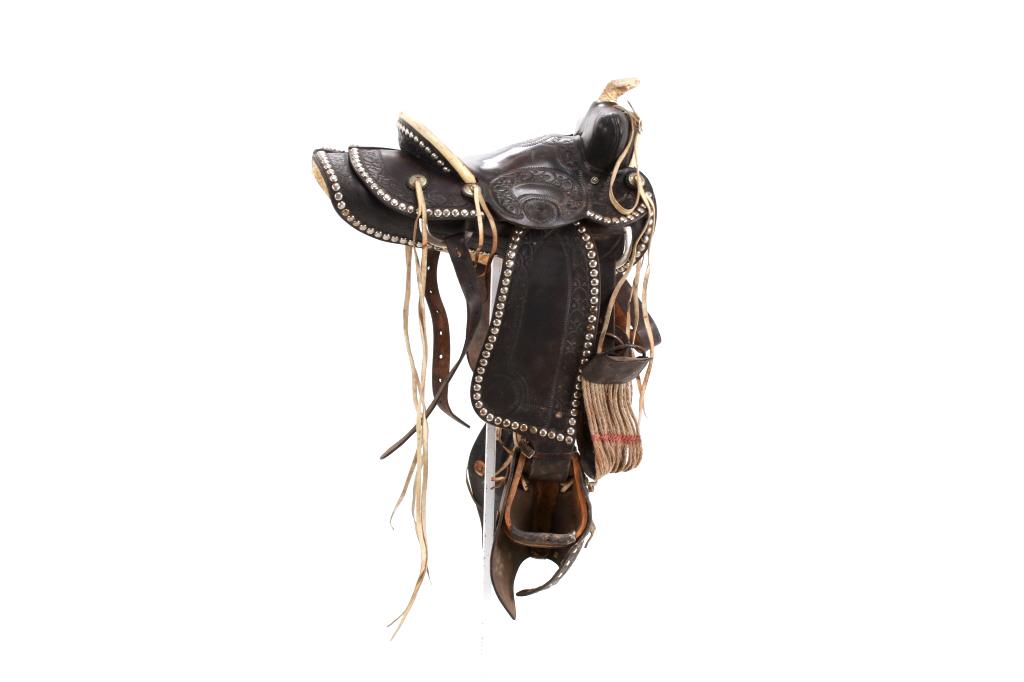Hess & Hopkins Studded Saddle & Studded Collar: Featured in this lot is a vintage Hess & Hopkins studded saddle, studded breast collar, and cinch from the early 1900s. Hess & Hopkins Leather Company was founded by Luther M. Hess & Theodore F. Hopki