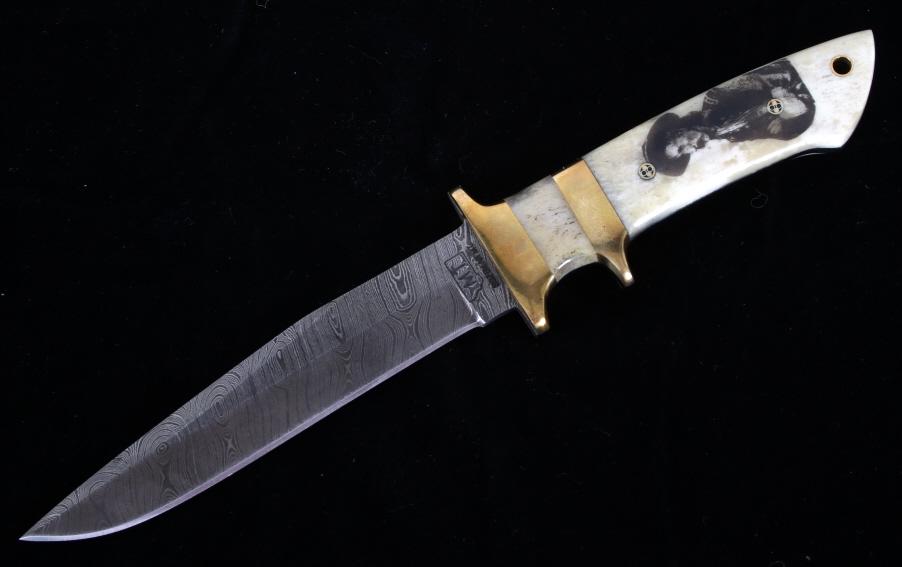 Montana Territory Custer Scrimshaw Damascus Knife: This is an original Montana Territory Knives of Bozeman, Montana knife with an excellent George Custer portrait scrimshaw artwork. This knife is truly a work of “Montana” art as it shows the portr
