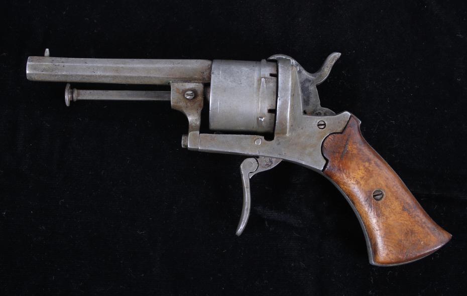 19th C. Belgian Folding Trigger Pinfire Revolver: Featured in this lot we have a 19th Century early Belgian proofed folding trigger pin fire revolver. This stunning revolver is chambered in 7mm. The revolver features straight grain walnut grips and a