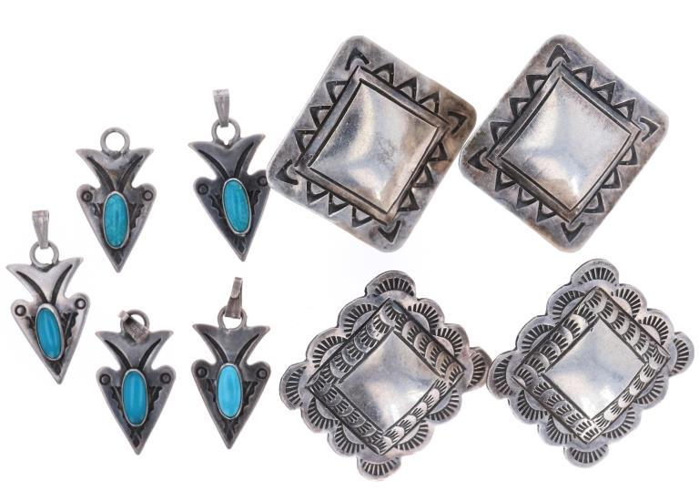 Navajo Sterling Earrings & 5 Pendants W/ Turquoise: Featured in this lot are these Navajo sterling earrings and sterling and Sleeping Beauty turquoise pendants made in Hamilton, Montana. The first set of sterling stud earrings feature a simple stamped 
