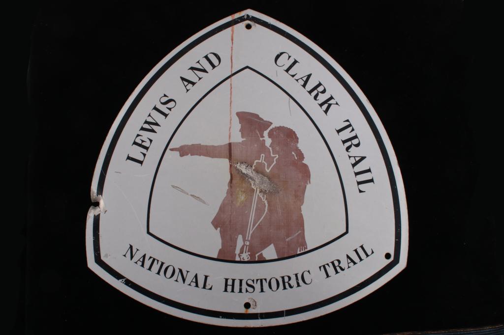 Lewis and Clark National Historic Trail Sign: Featured in this lot is a reflective Lewis and Clark National Historic Trail sign. The national historic trail traces the Lewis & Clark Expedition through 16 states and over 4,900 miles. Their nearly 