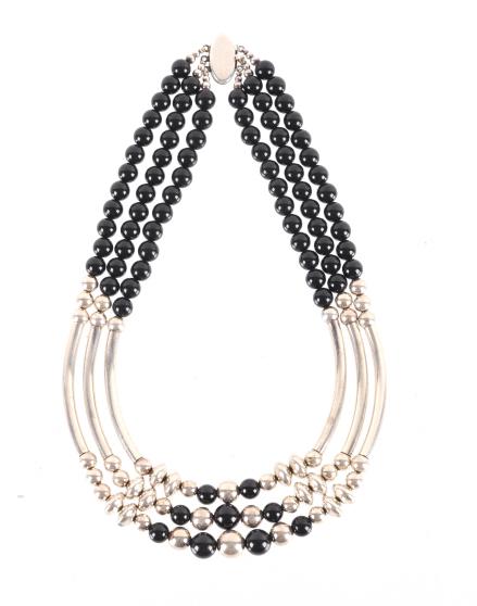 Taxco Mexico Sterling Silver Jet 3 Strand Necklace: Featured in this lot is a Taxco, Mexico sterling silver and jet three strand necklace. The necklace features a wonderfully and professionally crafted sterling silver and jet construction and shows a t
