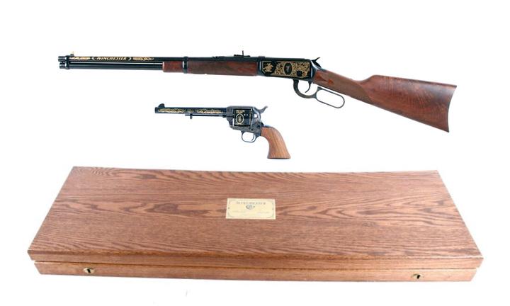 RARE Winchester '94 & Colt SAA Engraved Gold Set: This is an outstanding and rare Winchester and Colt two gun engraved and gold inlaid commemorative set in the original case, with matched serial numbers and matched .44-40 WCF calibers, dating to the 