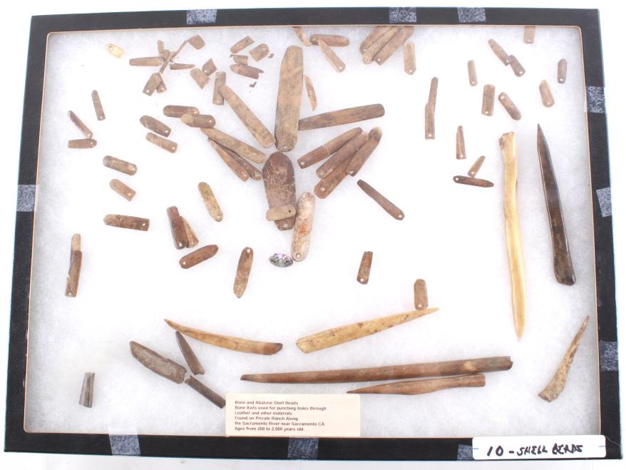 Ancestral Nisenan Maidu Bone Tools & Shells: A collection of bone and abalone shell beads, as well as bone awls and tools, from the Ancestral Nisenan Maidu people is a beautiful and historically significant example of Native American craftsmansh