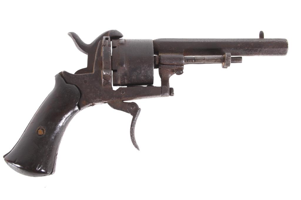 19th C. Belgian Folding Trigger Pinfire Revolver: Featured in this lot we have a 19th Century early Belgian proofed folding trigger pin fire revolver. This stunning revolver is chambered in 7mm. The revolver features straight grain walnut grips and a