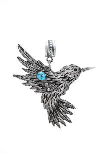 Richard Singer (Navajo Dine) Bird Sterling Pendant: This is an original, rare and detailed sterling silver and turquoise bird effigy necklace with immense detail from Navajo / Dine artist, Richard Singer. Richard Singer is a third-generation Navajo