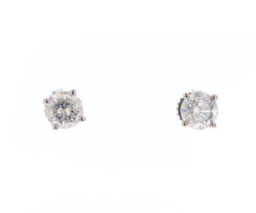 Brilliant Diamond & 18k White Gold Earrings: Featured in this lot is a brilliant diamond and 18k white gold earrings with GGA paperwork. The earrings feature a wonderfully and professionally crafted 18k white gold construction. The earrings