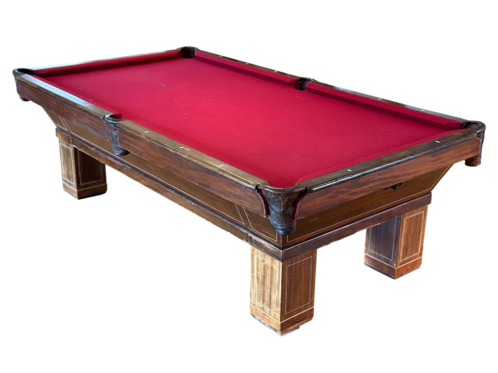 C. 1912 Brunswick-Balke-Collender Pool Table: The lot features an original Brunswick-Balke-Collender pool table dating to circa 1912, in original condition. The pool table is either a Richelieu, Homewood, Coreno, or The Reno model. The table show