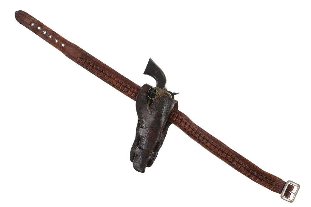 Navy Colt Revolver Prop Gun & Leather Gun Belt: Featured in this lot is this 1860 Navy Colt revolver prop gun and leather gun belt. The prop gun and leather gun belt are wonderfully and professionally crafted. The movie prop gun features the action