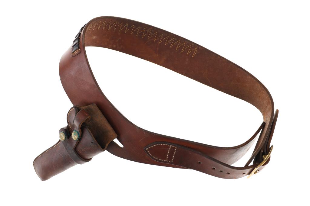 Hunter Snap Off Belt Holster and Buscadero Belt: Offered in this lot is a Colorado Saddlery & Hunter Company Snap Off Belt Holster and Buscadero Belt set. Both the holster and Buscadero belt model numbers indicates they fit a Ruger Bearcat Single Ac