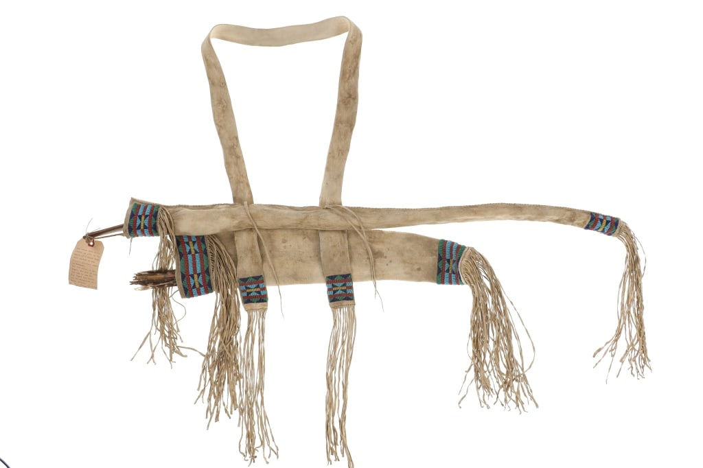 C. 1871 Sioux Beaded Bowcase, Quiver, Arrows & Bow: The lot features a beaded bowcase, quiver, bow and arrows from the Sioux Indians collected in 1871 from the Engel Ranch in Montana. The piece is accompanied by an old collection tag with typed and sig