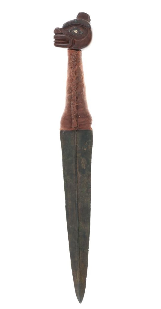 19th C. Tlingit Copper Dagger w/ Bear Pommel: This is a phenomenal 19th Century Tlingit / Haida Northwest Coast Indians forged copper large dag knife with figural Bear Totem carved head. The piece is very large, showing a forged copper double-edg