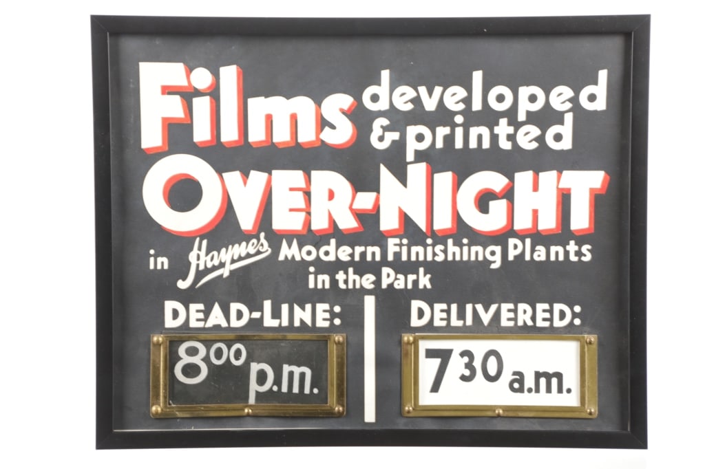 1900-1920's F.J. Haynes Yellowstone Original Sign: This is an original circa 1900-1920's Frank Jay Haynes Yellowstone Park Photography store advertising sign. The sign reads, "Films developed & printed Over-Night in Haynes Modern Finishing Plants in t