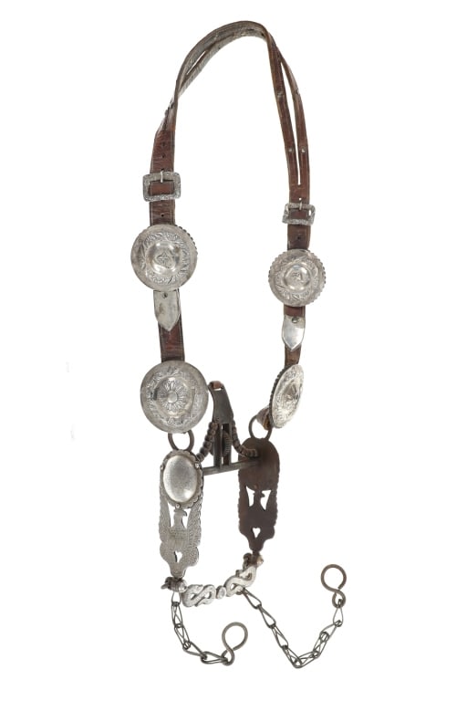 Ca. 1910 Jesus M. Tapia Silver Bridle & Eagle Bit: Featured in this lot is an original Jesus M. Tapia (1856-1931) circa 1910 silver mounted and inlaid Silver Eagle Spade Bit with Rattle Snake Slobber Bar on an original Mexican Silver horse headstall b