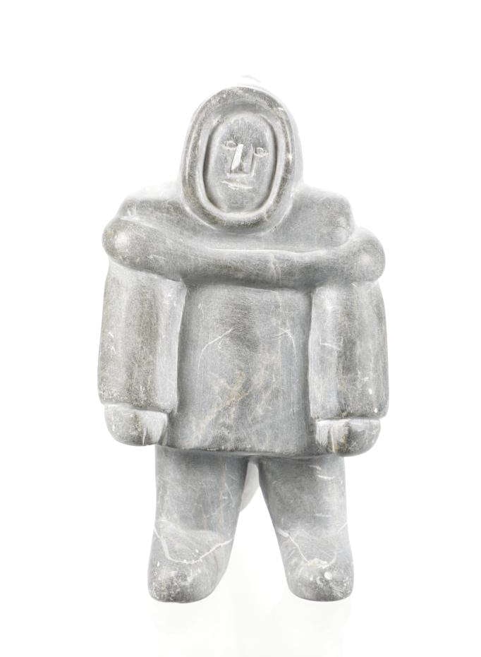 Eskimo K. Kumak Soapstone Native Hunter c. 1970s: Featured in this lot is this soapstone native hunter carving from Eskimo artist K. Kumak circa 1970's. The carving features a wonderfully and professionally crafted soapstone construction that shows a