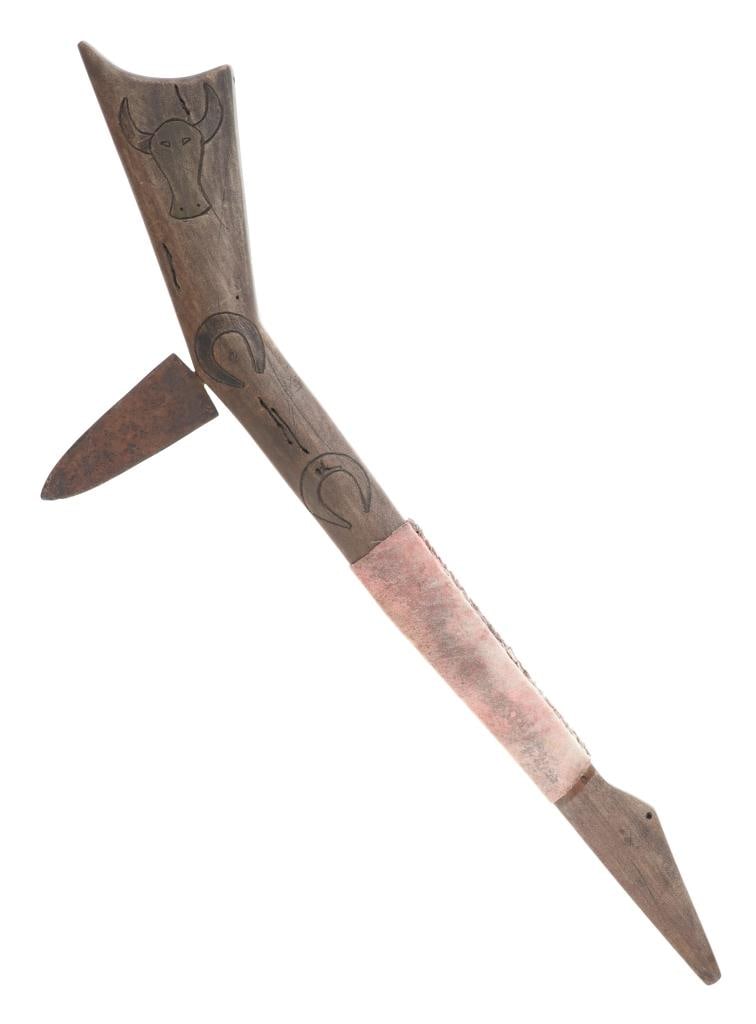 Plains Style Gunstock Spontoon War Club: The lot features a contemporary gunstock war club with spontoon blade in Plains Indian style. The pieces origin and age are not known, but it appears to be a late piece. The club has a classic gunstoc