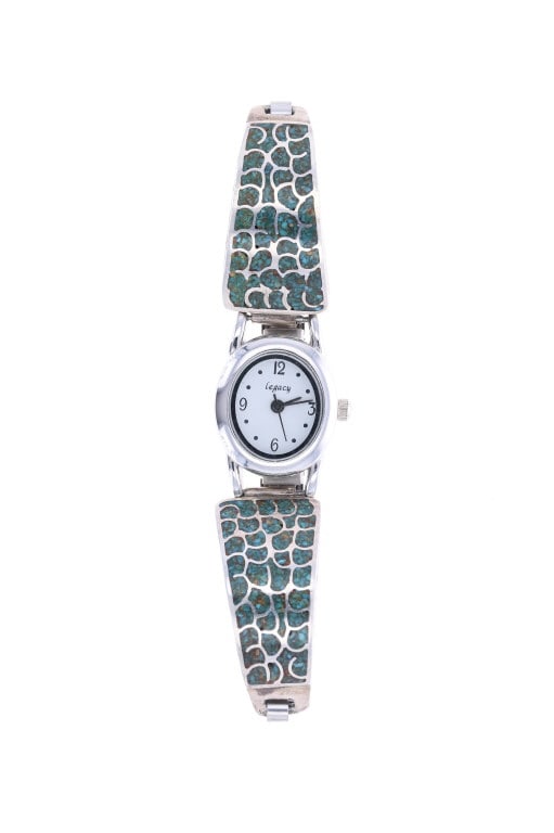 Vintage Zuni Sterling Turquoise Inlay Watch Band: Featured in this lot is a Vintage Zuni Sterling Silver Carico Lake Turquoise Hummingbird Design Inlay Adjustable Watch Band, circa 1960s to 1970s. Zuni inlay jewelry creates a gemstone mosaic, sometim