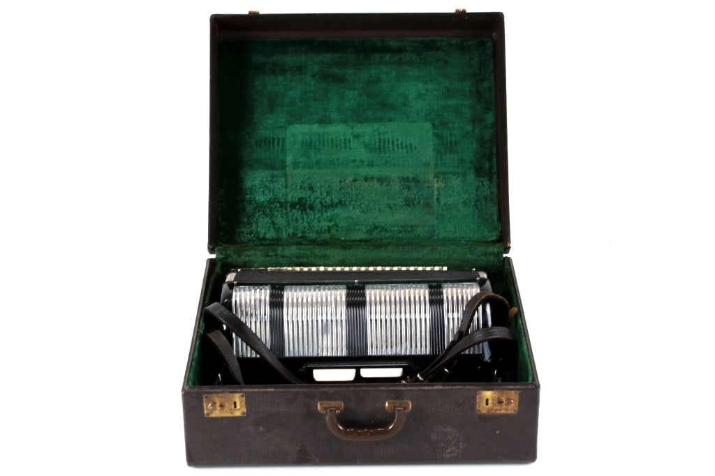Francini Piano Accordion, ca 1940s-1950s: Featured in this lot is a Vintage Francini Piano Accordion, made in Italy, circa 1950s. This is a full-size 120 bass, 41 "waterfall" treble keyboard on a 19.25" key bed. Two treble shifts, LMH and MH.