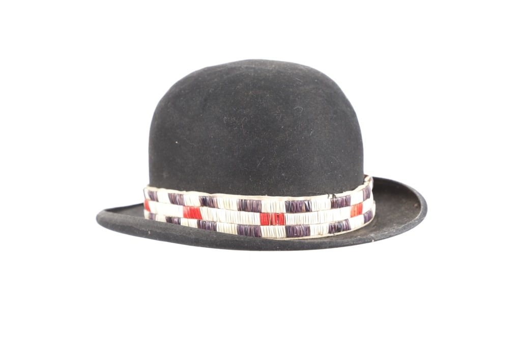 Antique American Bowler Hat w/ Quilled Hat Band: The lot features an antique American Bowler hat with a Indian tanned hide hat band covered with porcupine quillwork. The quillwork is likely from the Northern Plateau, a later addition to, exact age u