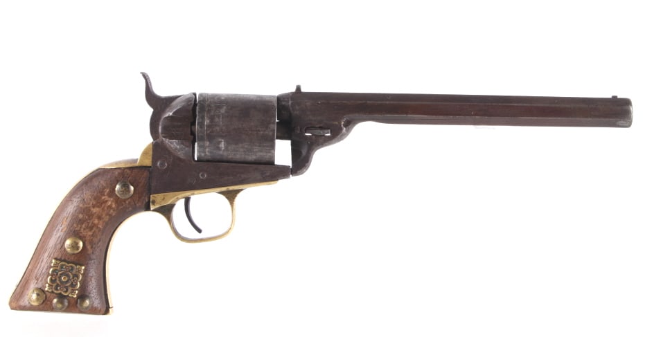 1851 Colt Navy Conversion - Oglala Warrior Tacked: The lot features a Colt Model 1851 Navy Richard-Mason Conversion revolver with brass trade tacking and marks from Oglala Lakota Sioux Warrior Buffalo Tail. The revolvers are the iconic and scarce, Ric