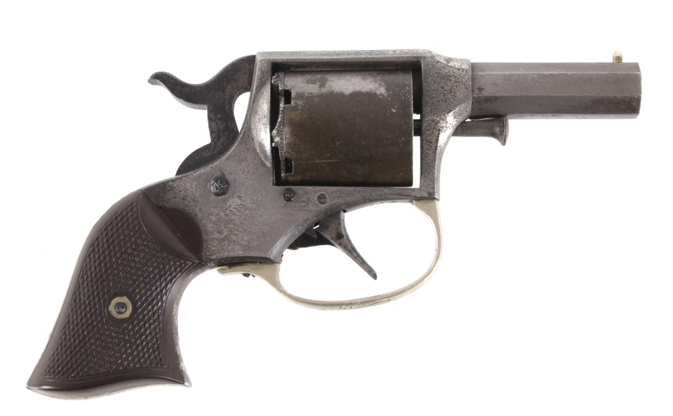 Remington Rider Pocket .31 Cal Revolver: Featured in this lot is a Remington Rider model rim fire pocket revolver chambered in .31 caliber. The revolver features a five shot cartridge cylinder, 2" long octagonal barrel, double action, and ch