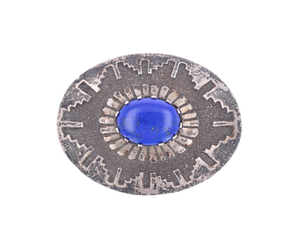 Navajo Hoskie Sterling Silver Lapis Lazuli Buckle: Featured in this lot is this Navajo Randy Hoskie sterling silver Lapis Lazuli buckle. The buckle features a wonderfully and professionally crafted sterling silver and Lapis Lazuli construction that sh