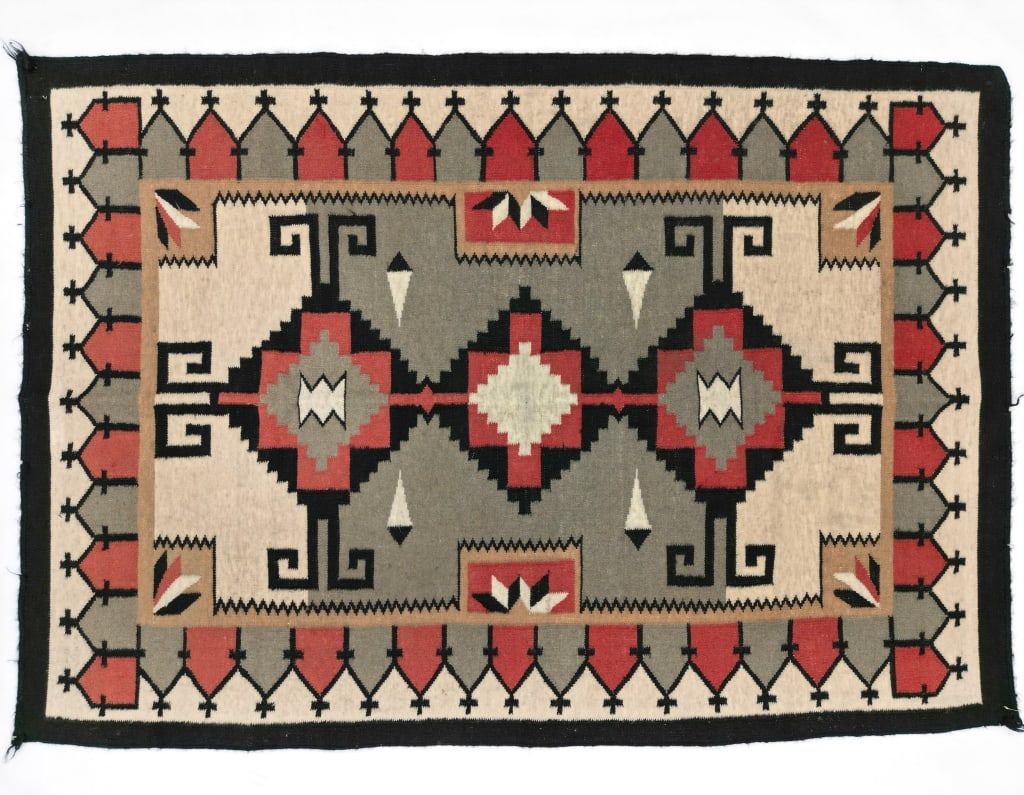 Custom Navajo Style Bistie or Teec Nos Pos Rug: Featured in this lot is this custom Navajo style Bistie or Teec Nos Pos rug. The rug features a wonderfully and professionally crafted wool blend construction that shows a Navajo style that closely re