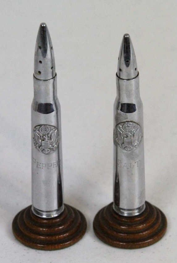 WWII Trench Art Salt & Pepper: These are WWII Trench art from the US troops. 43 T W. Measures 6" tall.