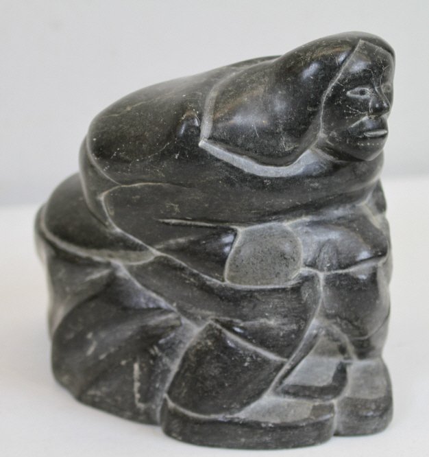 Inuit Eskimo Original Art Statue: This is a hand carved original Inuit Eskimo Carving of a Eskimo Tribal person crouched over. Excellent condition with great detailing. Measures 10.5" tall and 12" long.