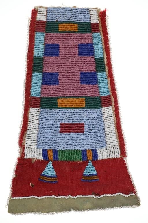 Ca. 1880's Plateau Indians Beaded Tomahawk Drop: This is an original circa 1880’s Plateau Indians beaded tomahawk drop. The tomahawk drop is comprised of Indian tanned hide construction that is sinew and trade thread sewn that shows a polygonal sh