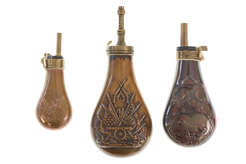 Vintage Brass Powder Flasks Mid 1900s (3): For your consideration are three brass, vintage powder flasks made mid 1900s. The first and largest in the lot is marked, "Made in Italy" on the top and features a push spout for dispensing black powd