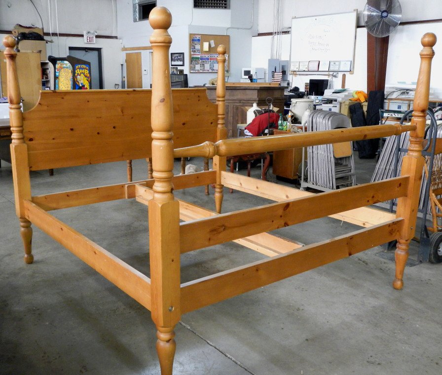 Four Post King Bed Frame: This piece is made of Pine Solid Wood and is in good condition. All the pieces are included even the center piece for a more stable straight bed.