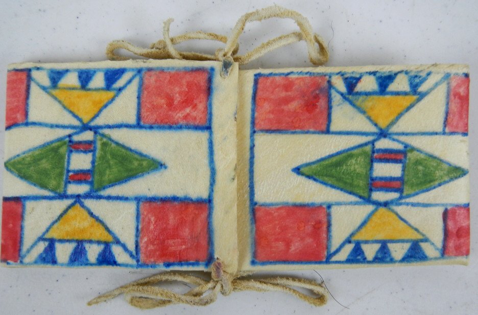 Crow Parfleche Envelope: This is a more modern Piece of Parfleche made of Elk Rawhide and original clay Paints. Measures 7"x3"