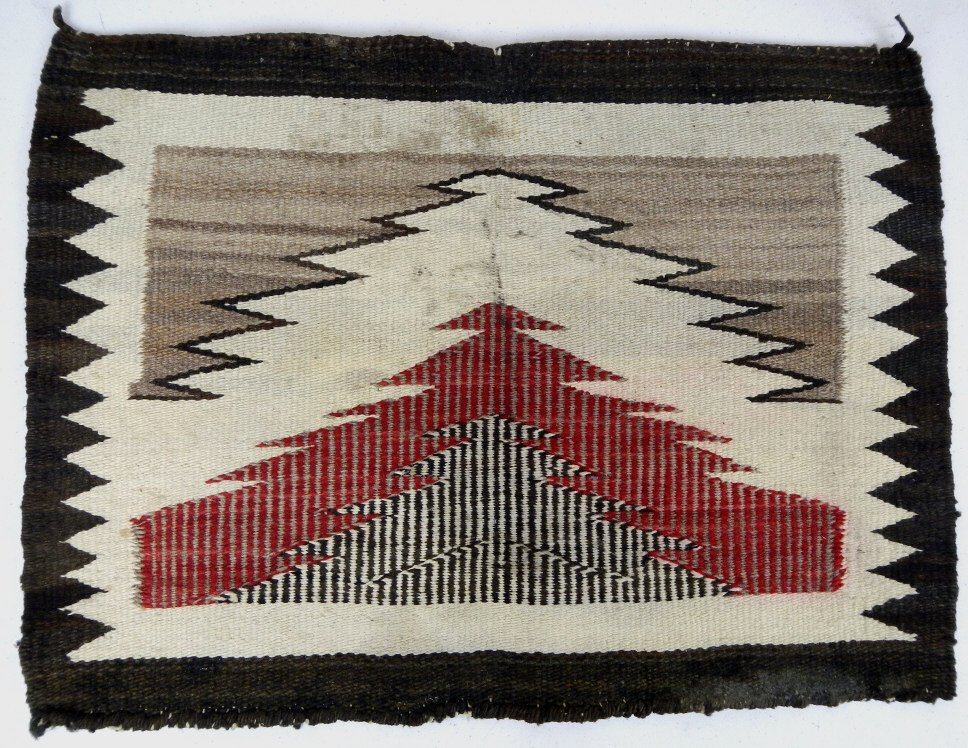 Genuine Navajo Sampler Rug: This is a hand knotted Kilim Navajo rug from early 1900's and late 1800's. This would be sold or given as a sample of the larger full size rug. Measures 22.75"x17"