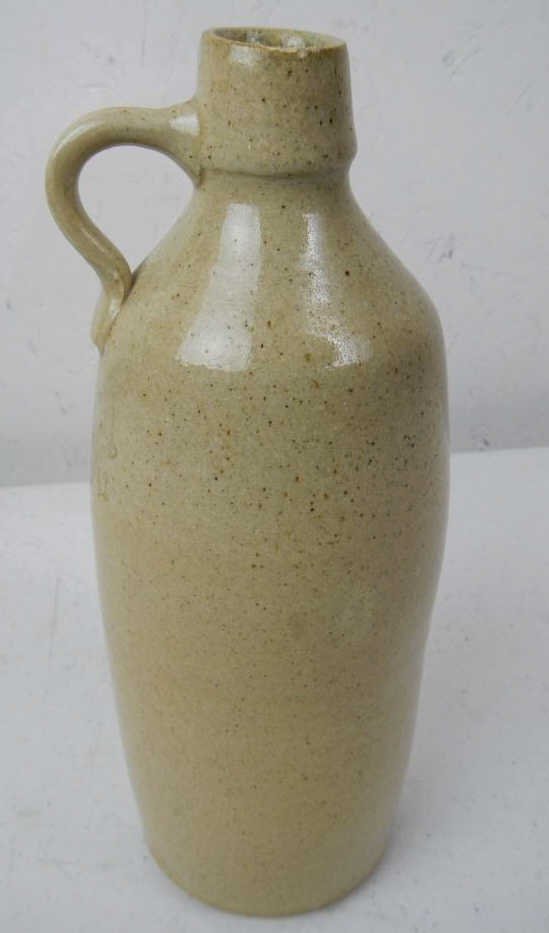 Scottish Stoneware Beer Bottle 1893-1993: This piece is made of Stoneware and has a good salt glaze. The front shows a name that cannot be entirely made out, "Glanijon L '93" This is thought to be from 1893 by the seller, but could be from 19