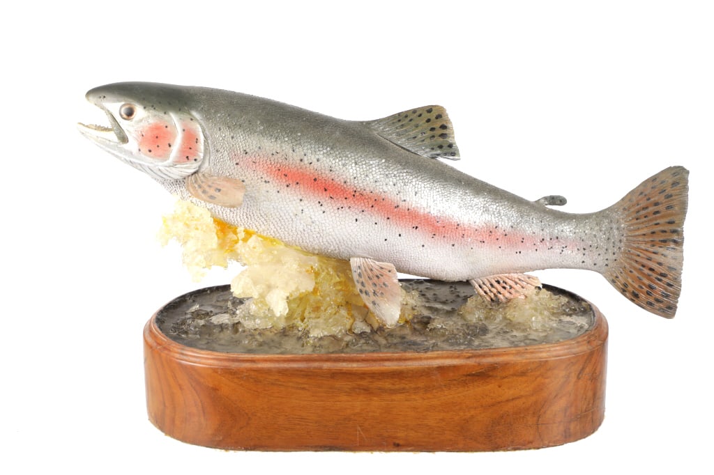 Michael Scott Hand Carved Jumping Rainbow Trout: Featured in this lot is this hand carved original jumping rainbow trout by Michael Scott. The rainbow trout features a wonderfully and professionally crafted hand carved wood and celluloid constructio