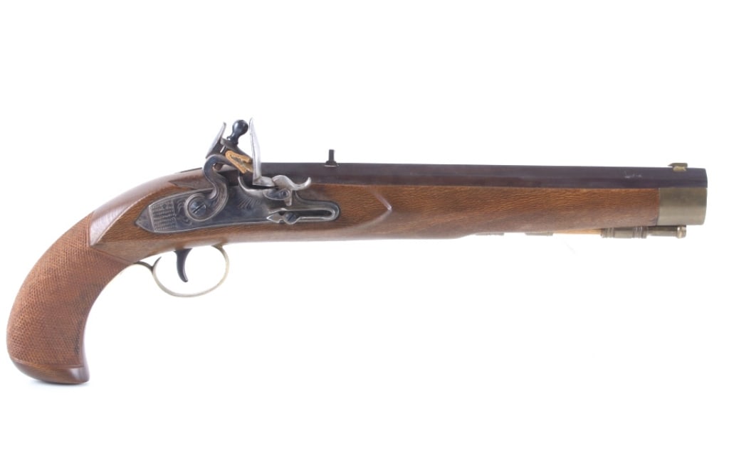 High Grade Deluxe Flintlock .40 Cal Dueling Pistol: This is an excellent, handmade, and custom flintlock black powder pistol with high grade deluxe finish chambered in .40 caliber. The pistol shows an expertly finished hardwood high grade oak or walnut