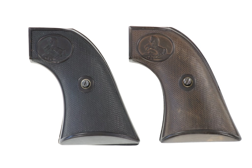 C. 1893-40 Colt SAA 1st Gen. M. 1873 Grip Sets (2): The lot features two sets of factory original Colt Model 1873 Single Action Army Revolver first generation hard rubber grips with screws, referred to by collectors as the Colt Eagleless grips. These g